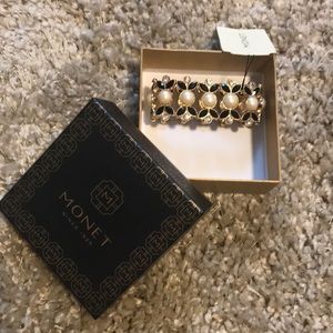 Bracket. Never worn, with tags.